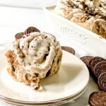 Oreo cinnamon roll with cream cheese filling on a plate