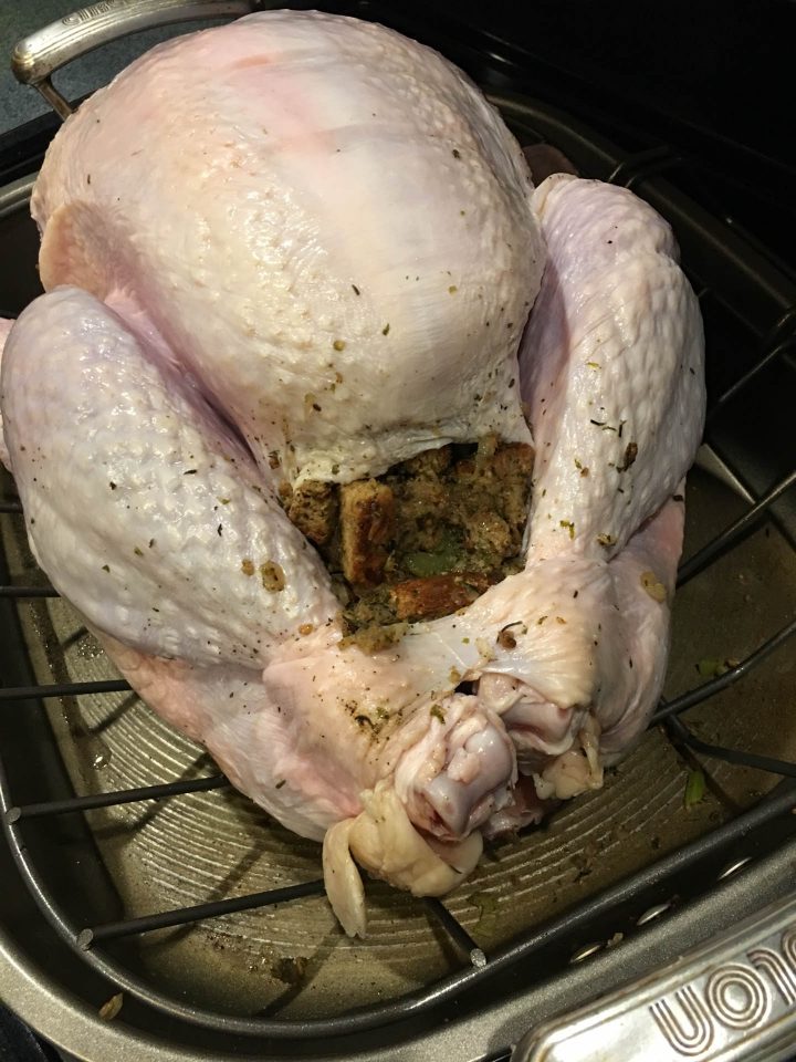 Turkey stuffing in the main cavity of the turkey