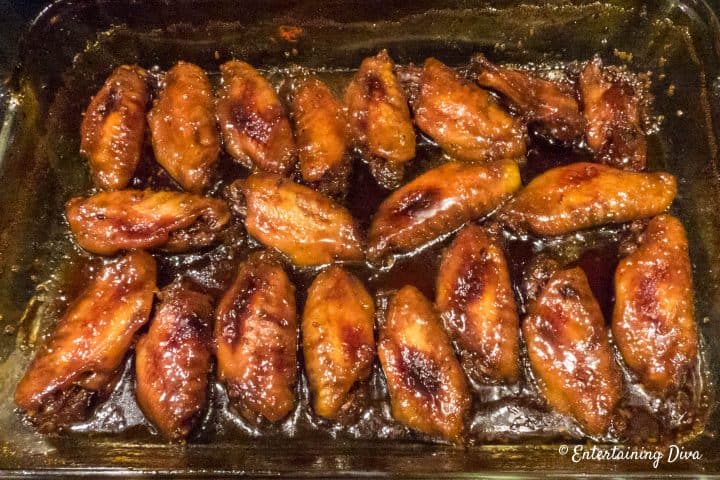 Sticky Chinese chicken wings in the pan after baking