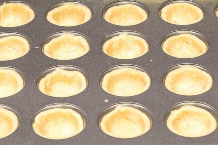 Line the muffin tins with round circles cut from the dough | No-Fail Pie Crust Pastry
