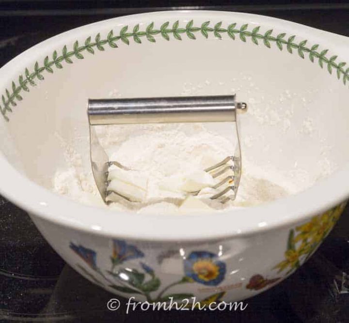 A pastry cutter makes cutting in the butter and shortening easier | No-Fail Pie Crust Pastry