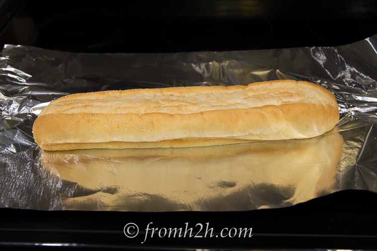 Place the french loaf on a piece of foil that is big enough to wrap it