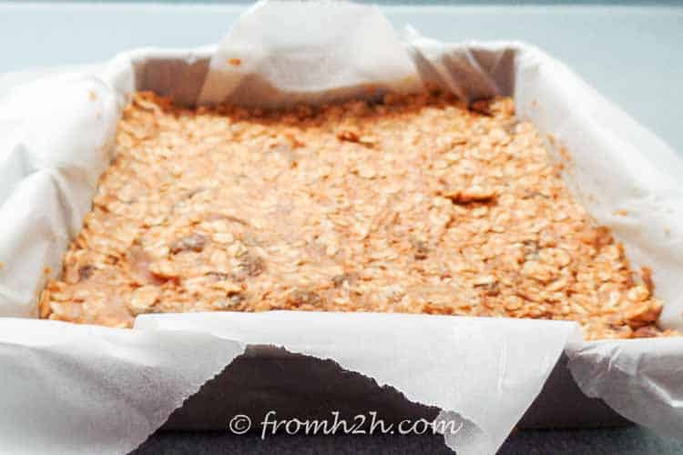 Press the granola bar ingredients into the pan | Sugar Free and Gluten Free Granola Bars