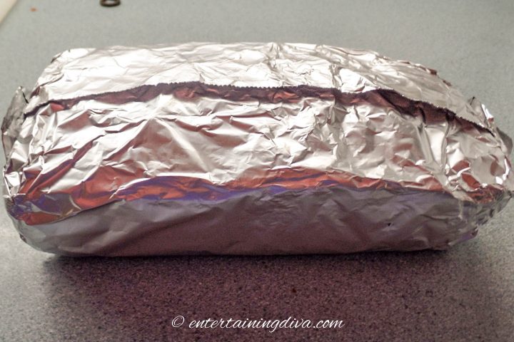 Christmas fruit cake wrapped with foil