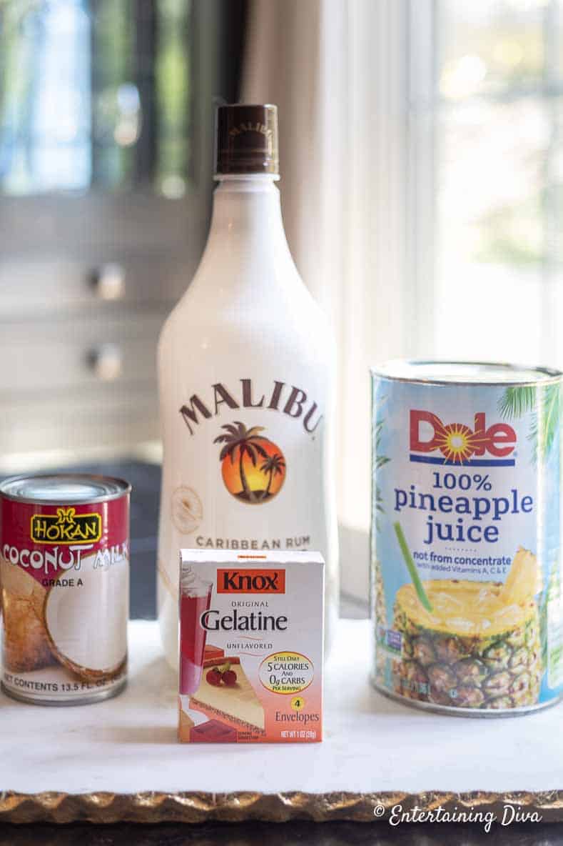 white pina colada jelly shot ingredients - Coconut milk, coconut rum, pineapple juice, unflavored gelatin