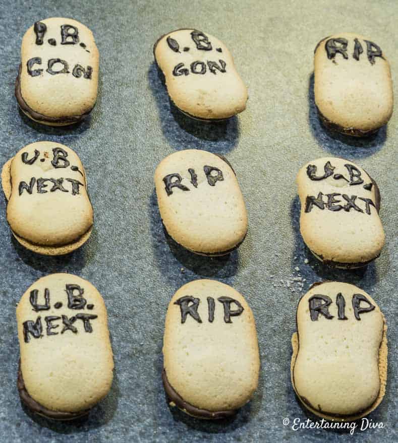 Tombstone cookies with chocolate writing