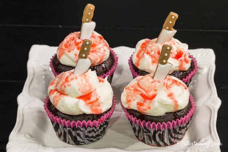 Halloween knife cupcakes on a plate