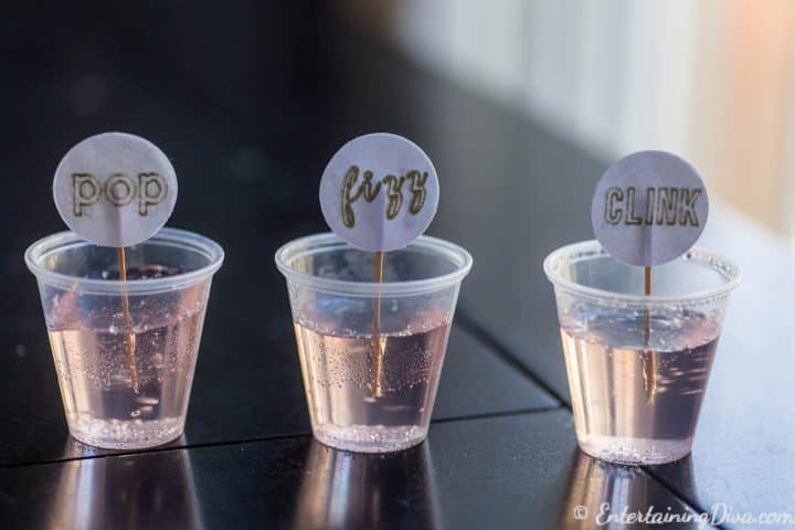 Pink champagne jello shots with pop, fizz, clink toothpicks