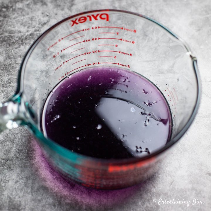 The mixed purple jello for the first layer of the Mardi Gras Jello Shots recipe
