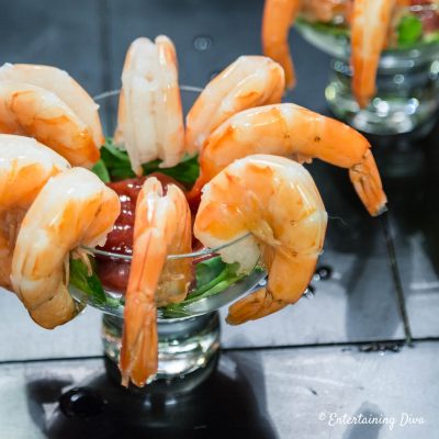shrimp cocktail with sauce in a glass dish