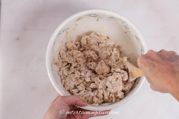 Maple pecan scones dough being mixed in a bowl