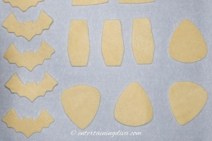 Cut out cookies on a cookie sheet