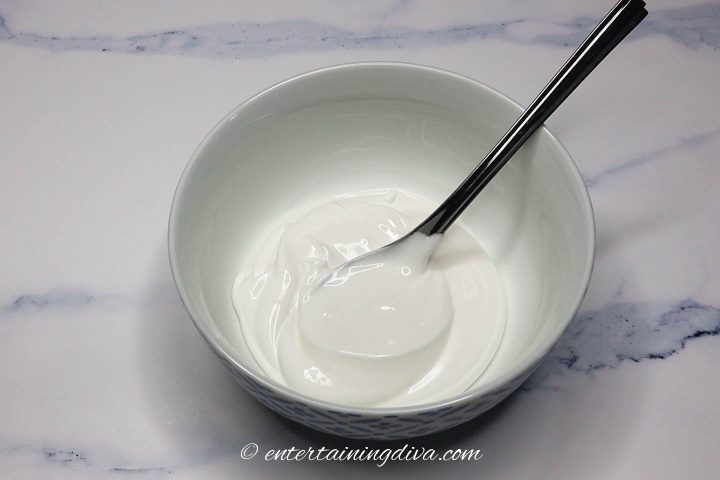 white royal icing in a bowl