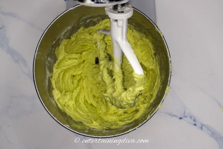 green key lime cupcake batter being mixed