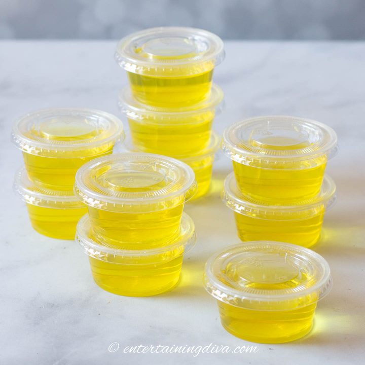 a stack of pina colada jello shot cups