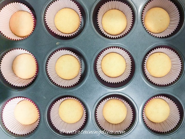 Cupcake liners with vanilla wafers in a muffin tin