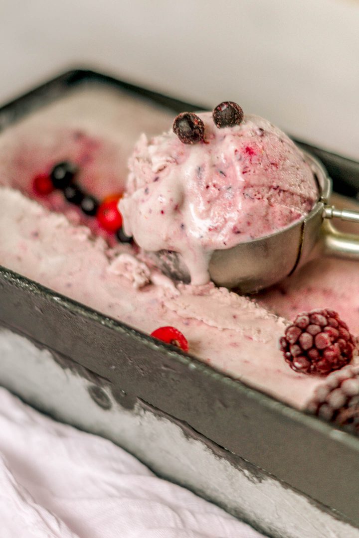 close up of no churn berry ice cream with berries