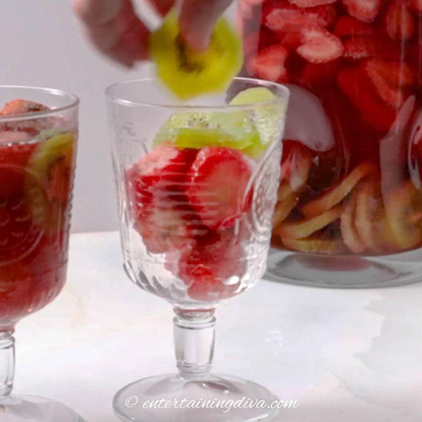 kiwis and strawberries in a glass