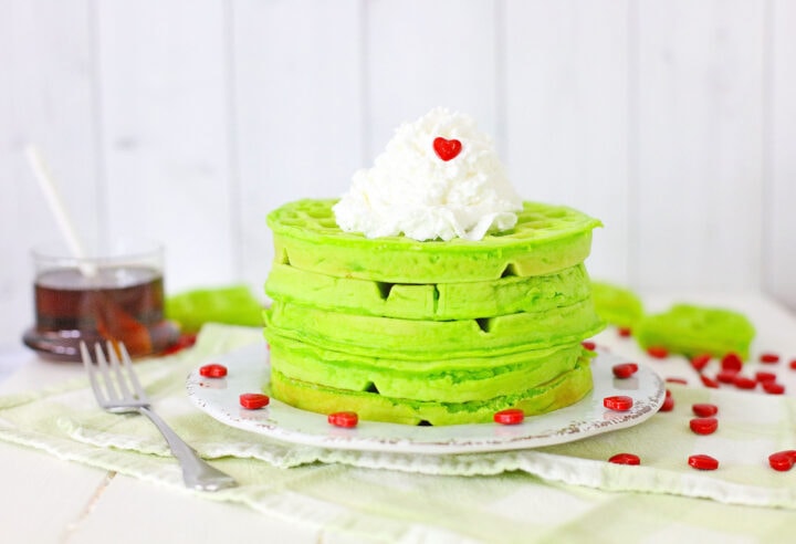 green Grinch waffles with whipped cream