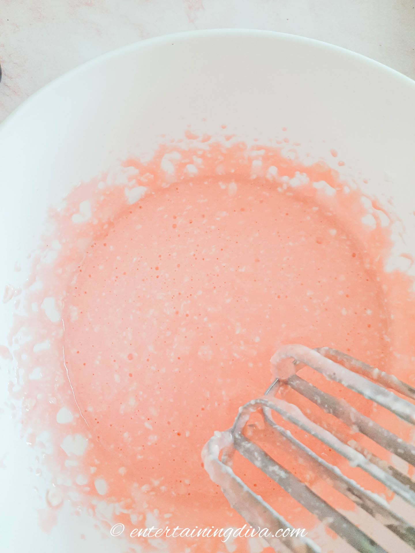 The peppermint cheesecake batter in a bowl