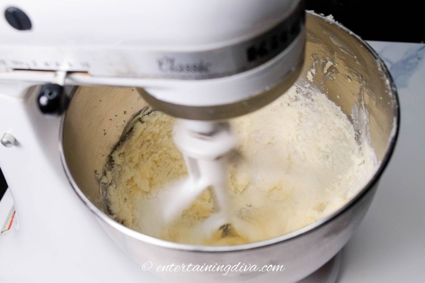 Butter and shortening being mixed in an electric mixer