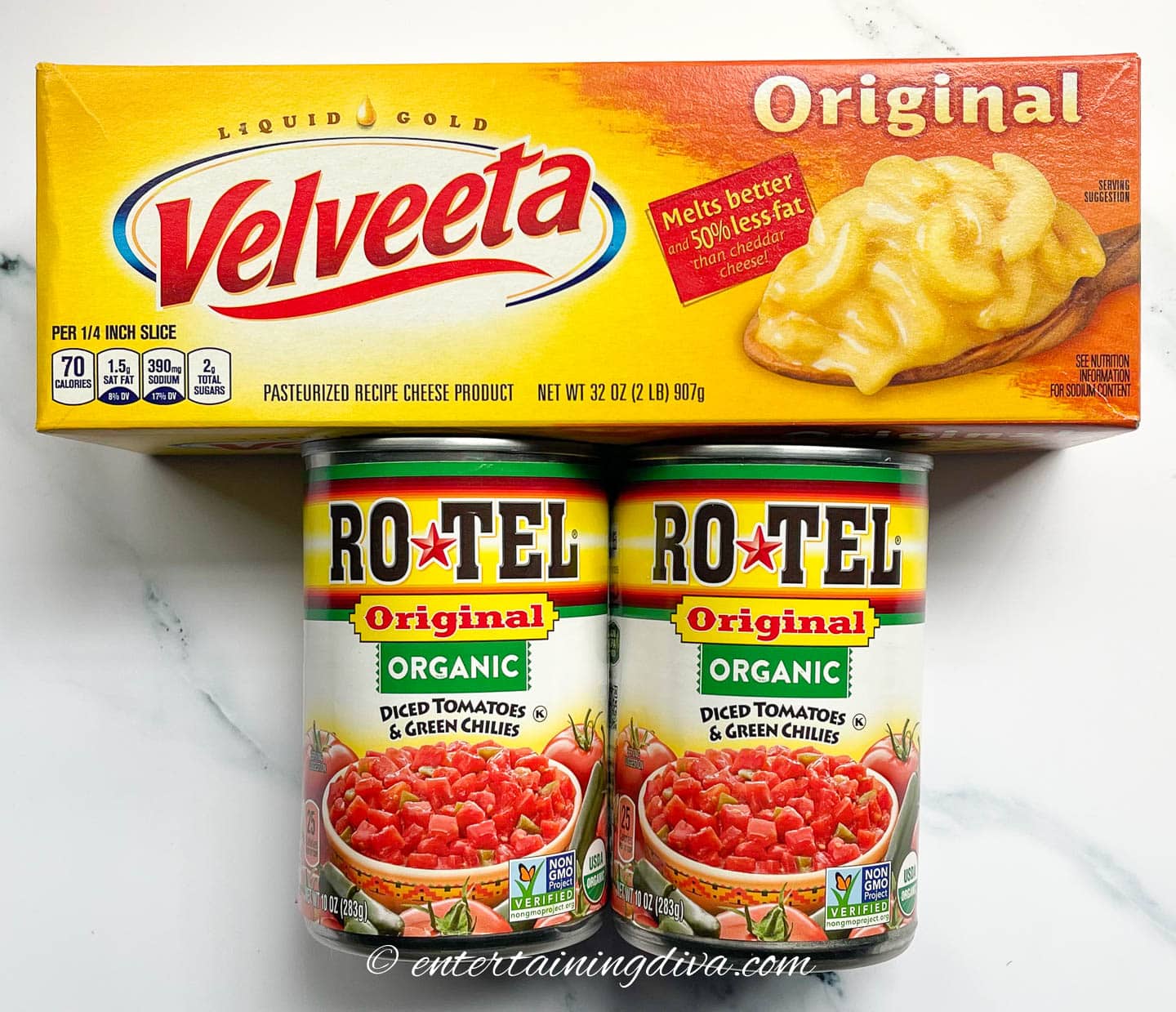 A package of Velveeta and two cans of Rotel