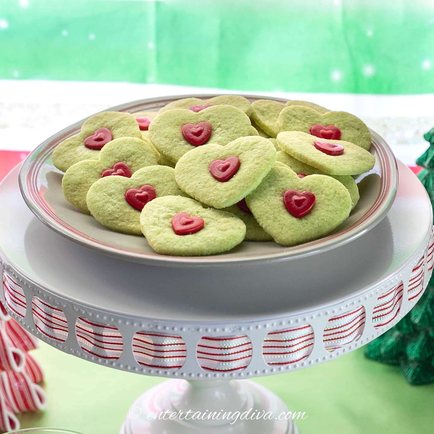 Green Grinch sugar cookies on a plate
