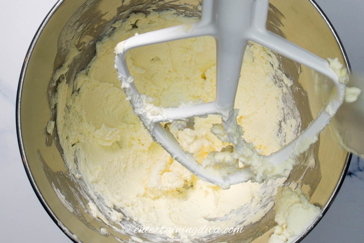 Cream cheese and butter in a mixer bowl