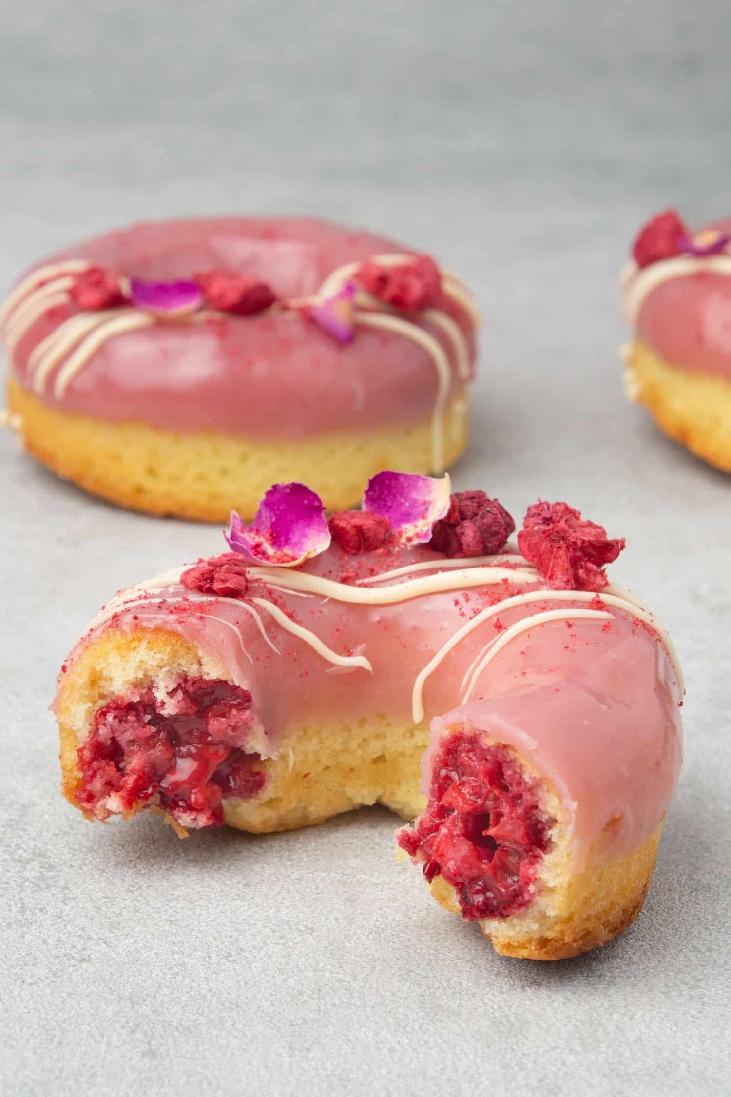 Baked raspberry and rose donuts