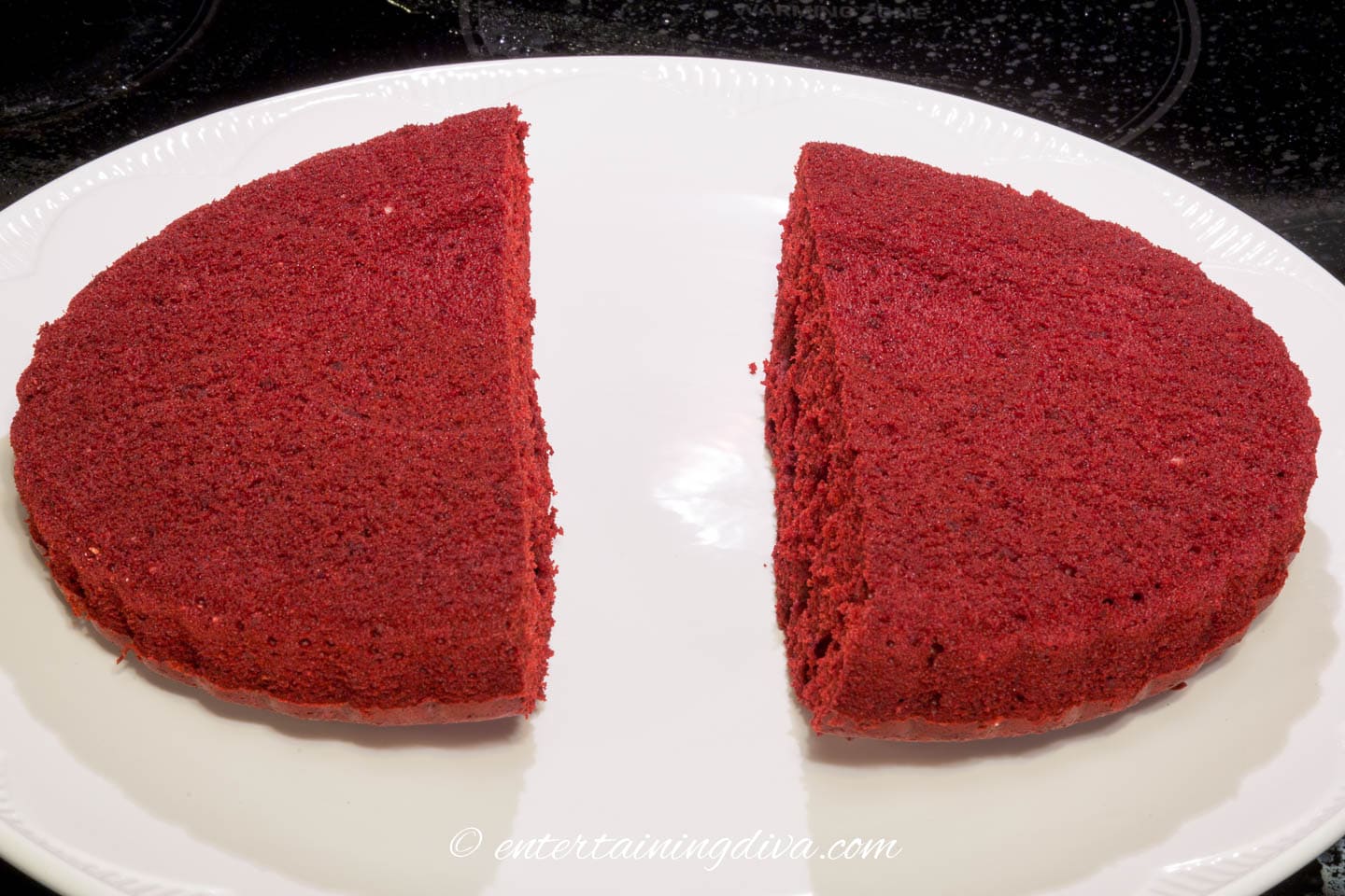 round red velvet cake cut in half