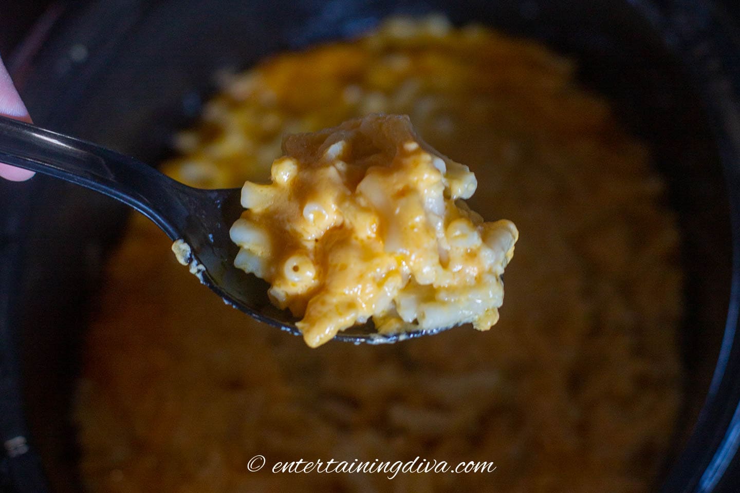 A spoonful of slow cooker macaroni and cheese