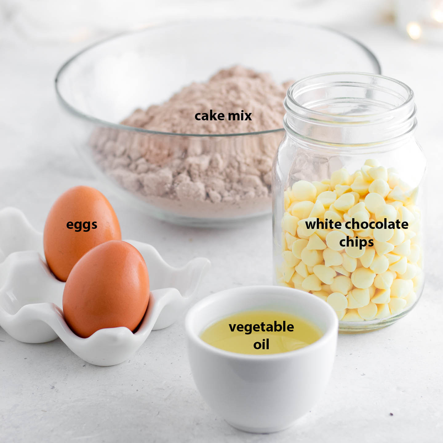 red velvet cake mix cookie ingredients - cake mix, eggs, vegetable oil, white chocolate chips