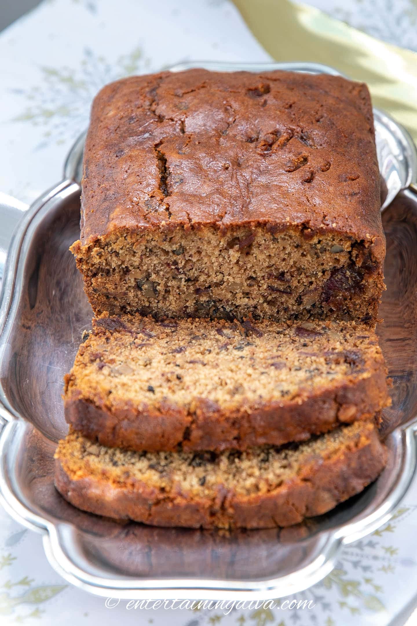 A loaf of old-fashioned date walnut bread sliced