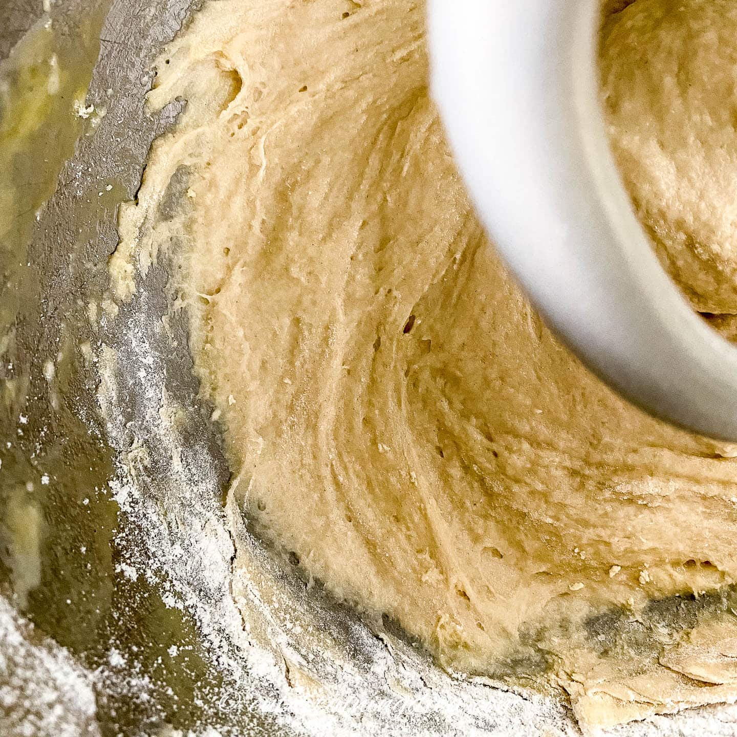 Cinnamon roll dough in a mixer