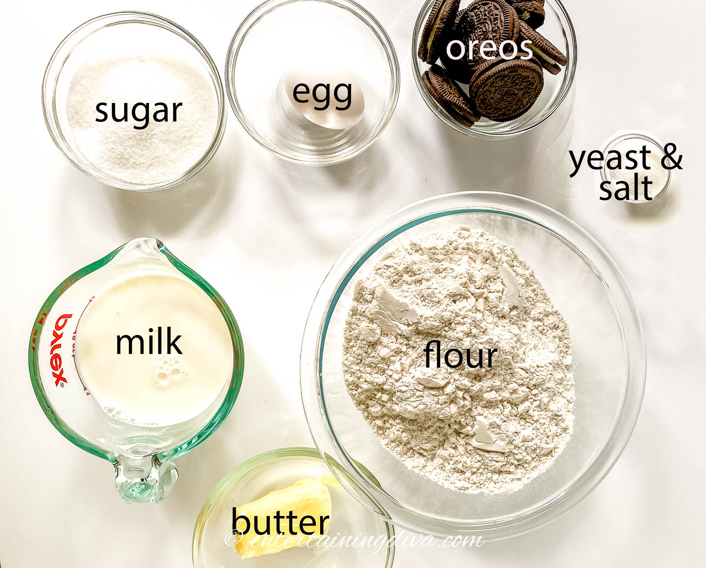 Oreo cinnamon roll dough ingredients - sugar, egg, Oreos, yeast, salt, milk, flour and butter