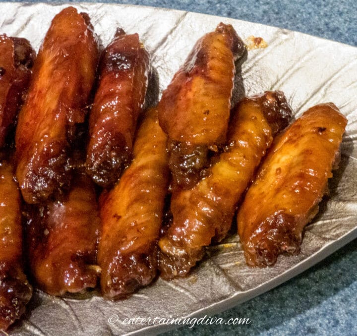 baked sticky Chinese chicken wings on a plate