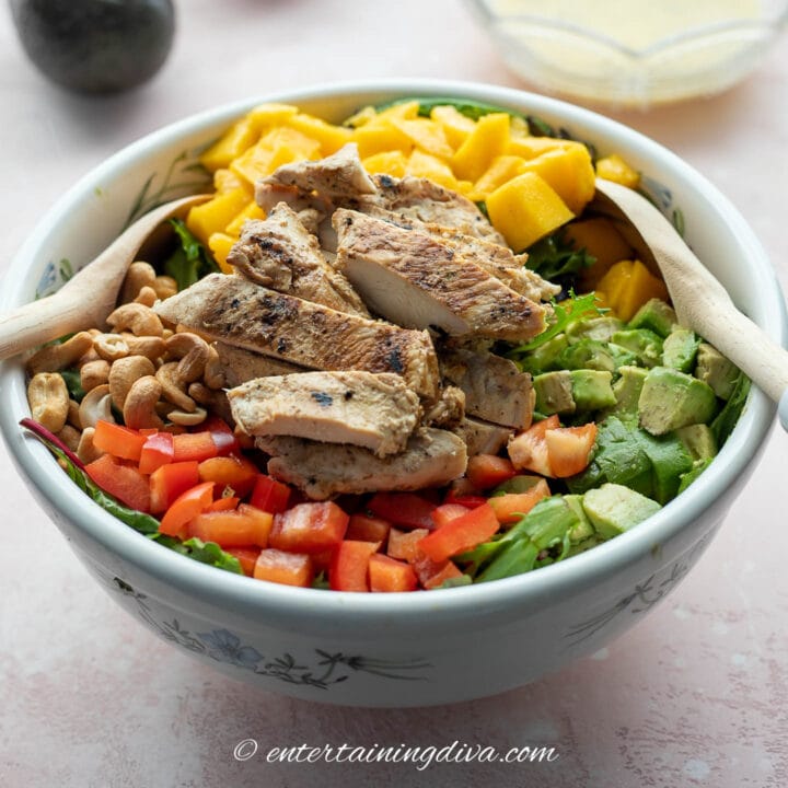 grilled chicken garden salad with fruit and nuts