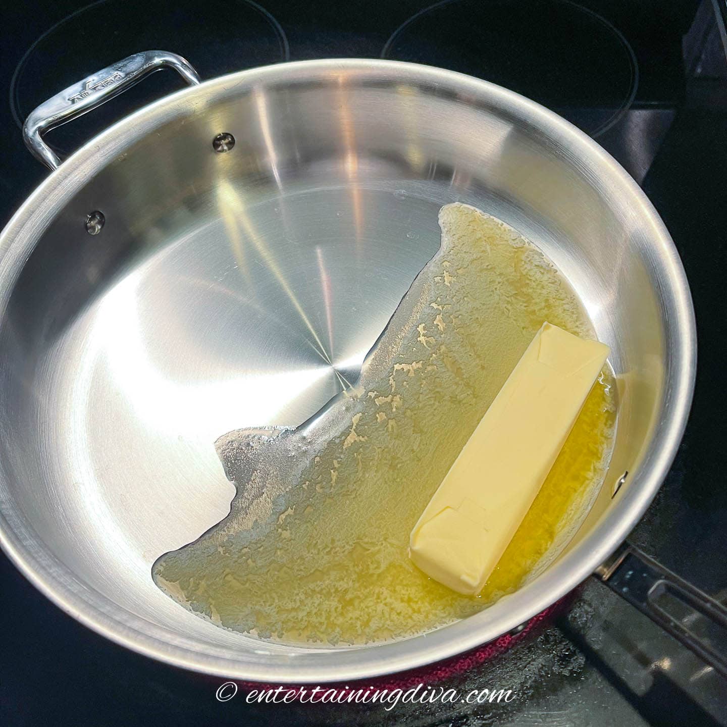 butter melting in a saucepan on the stove