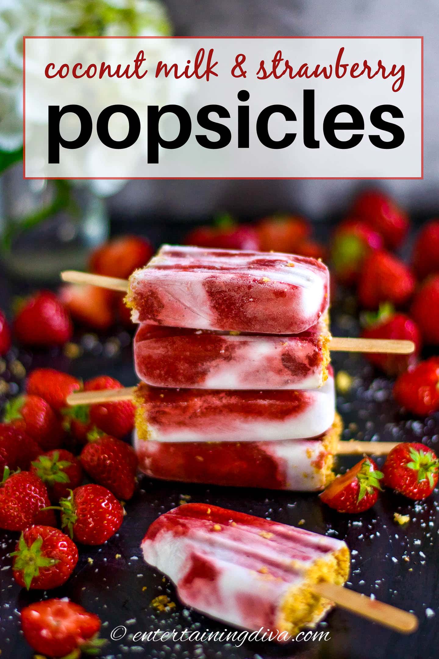 coconut milk strawberry popsicles in a stack