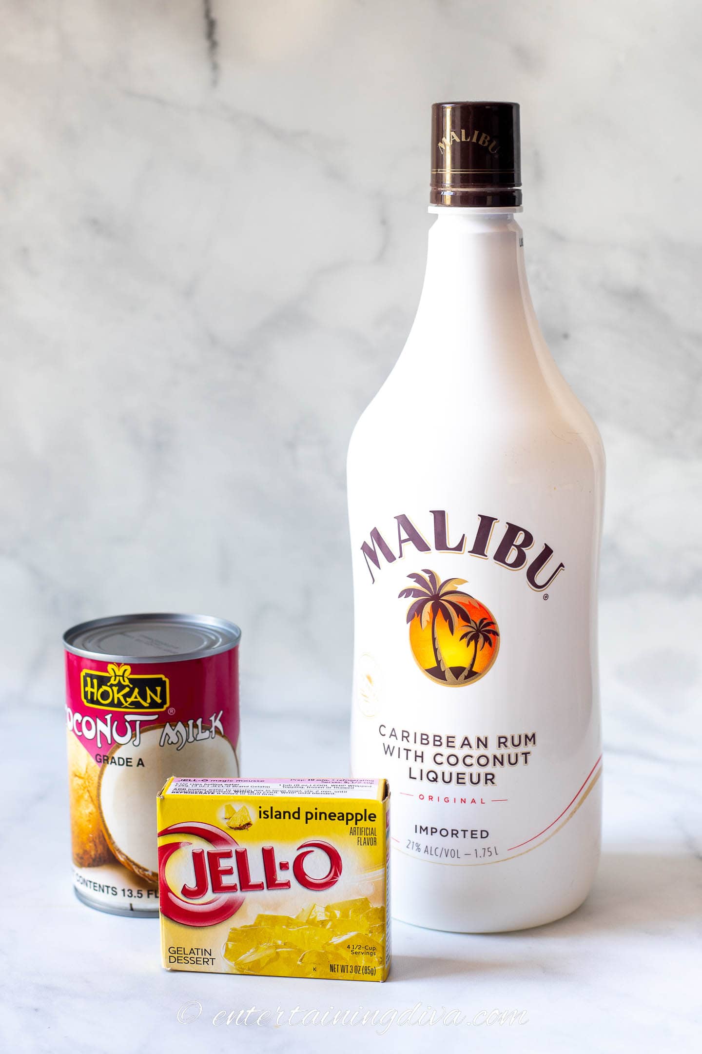 creamy piña colada jello shot ingredients - coconut milk, pineapple jello and malibu rum
