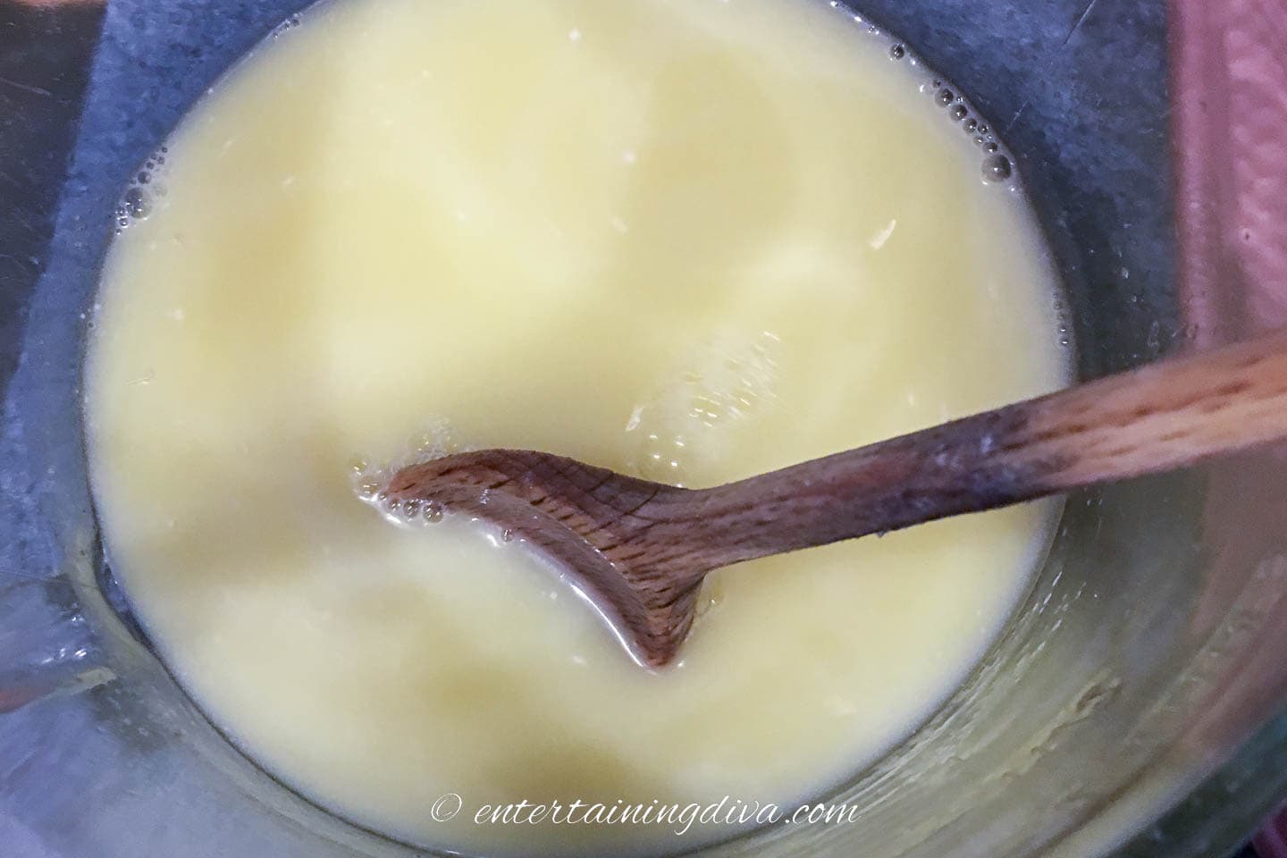 The pina colada jello shot mixture in a bowl