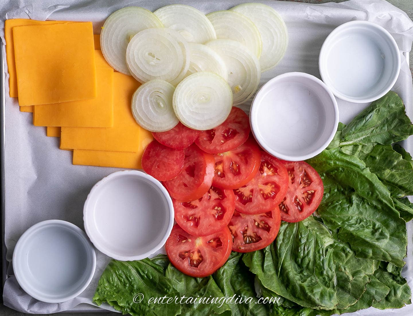 how to make a burger board step 5: bowls, lettuce, cheese, tomatoes and onions