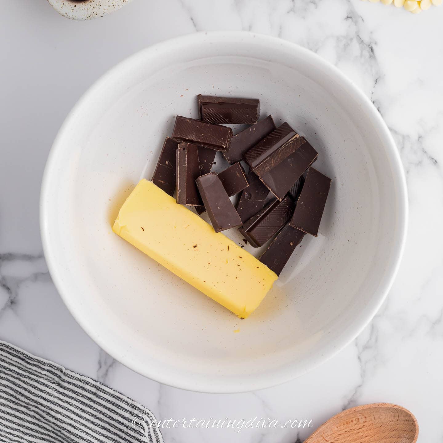 butter and chocolate in a microwaveable bowl