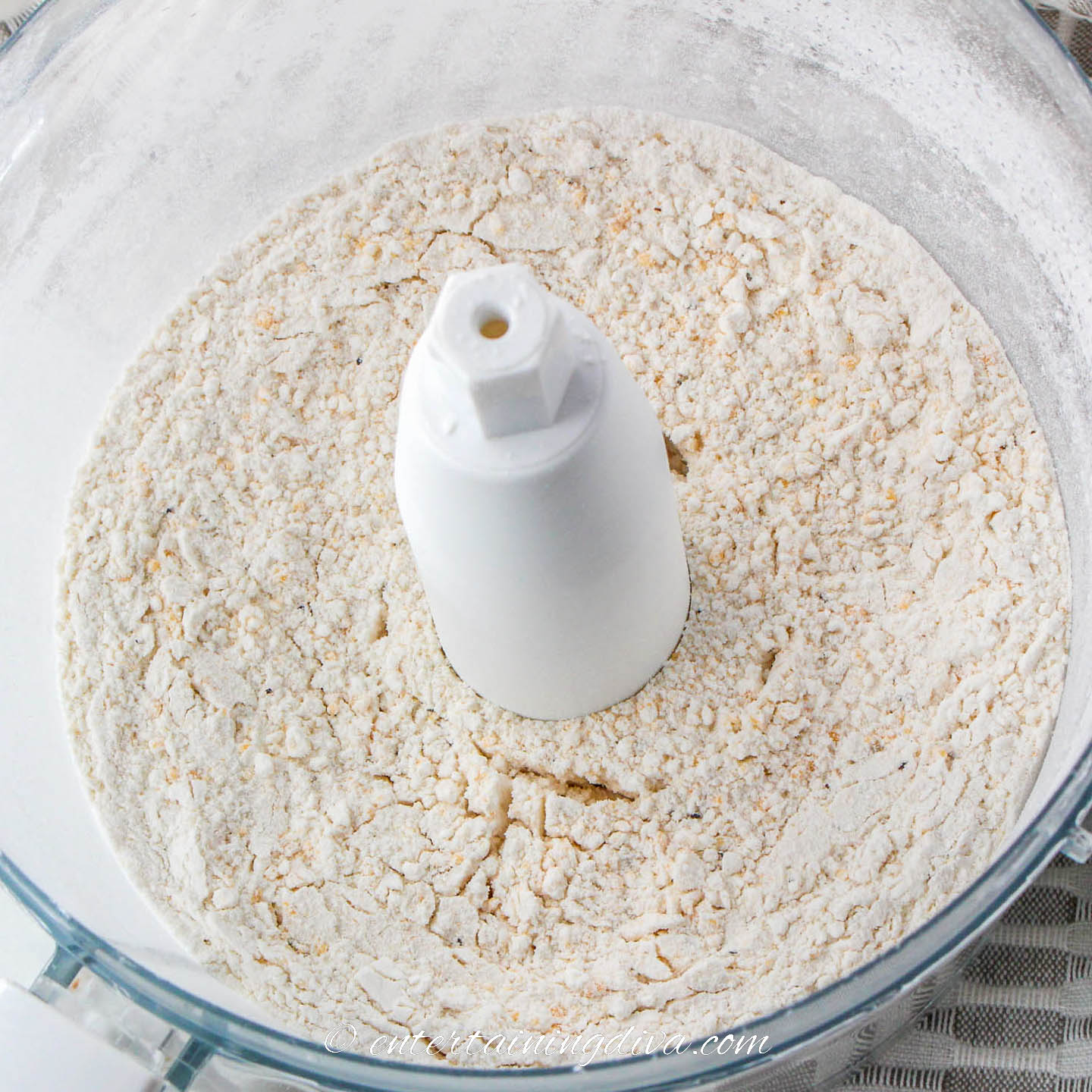 flour, cheese and pepper combined in a food processor