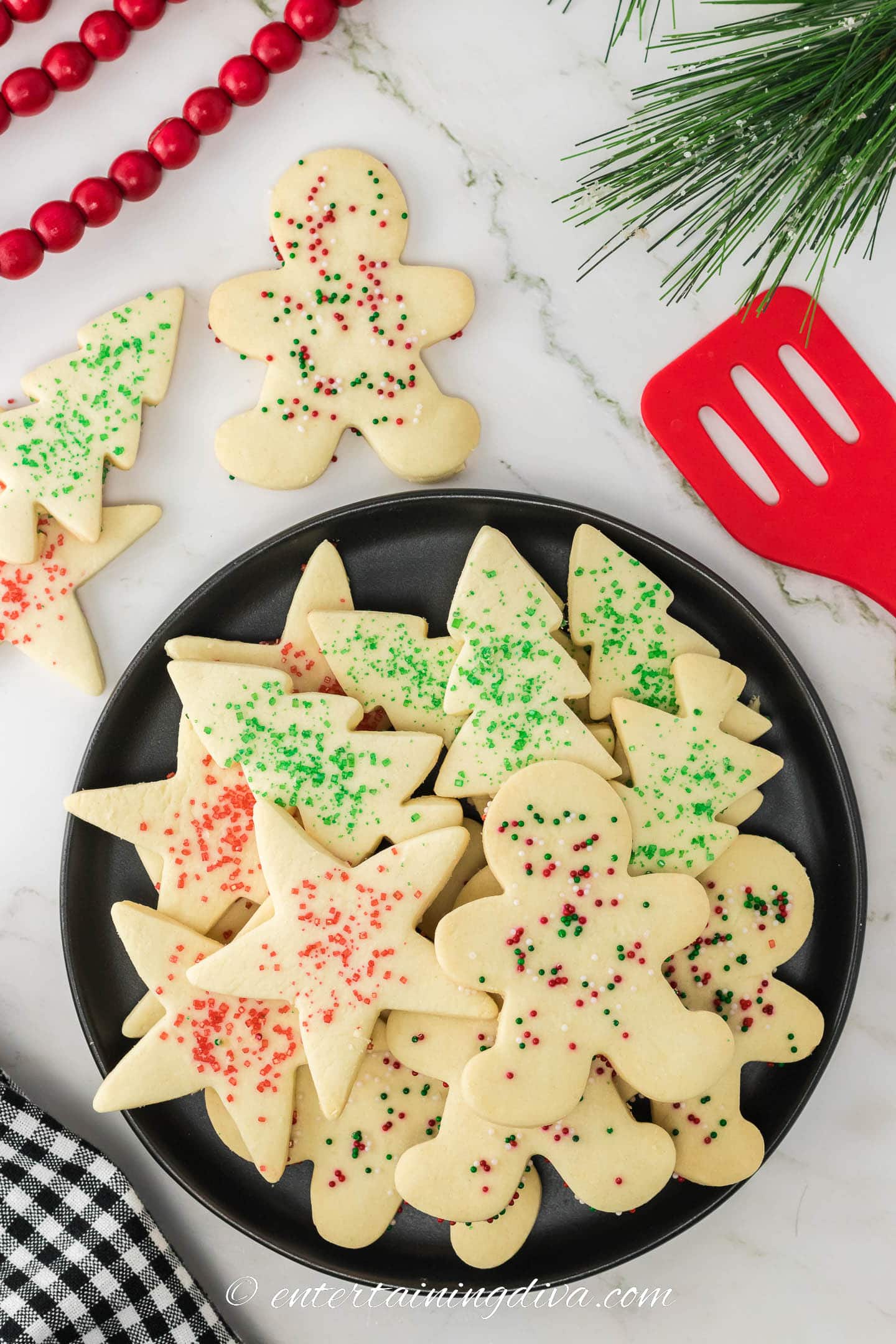 cut out shortbread Christmas cookies on a plate