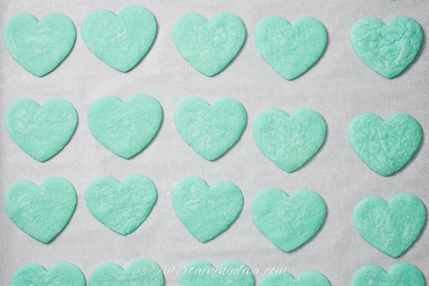blue heart cookies on a cookie sheet