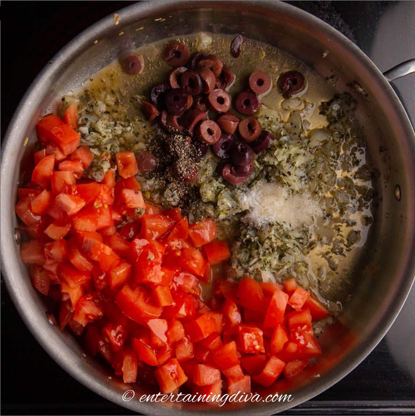 diced tomatoes, kalamata olives, onions, spices and olive oil in a saute pan