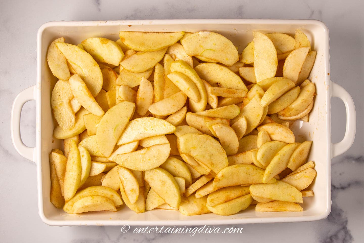 apples spread out in a 9" x 13" baking pan