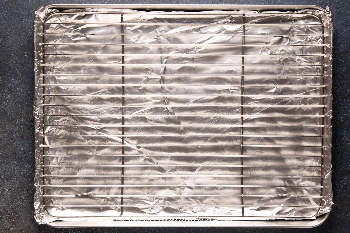 baking sheet lined with foil and a wire rack