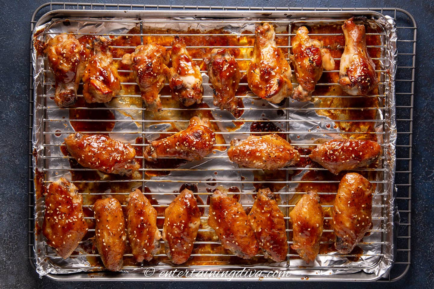 Baked chicken wings with oyster sauce on a baking rack